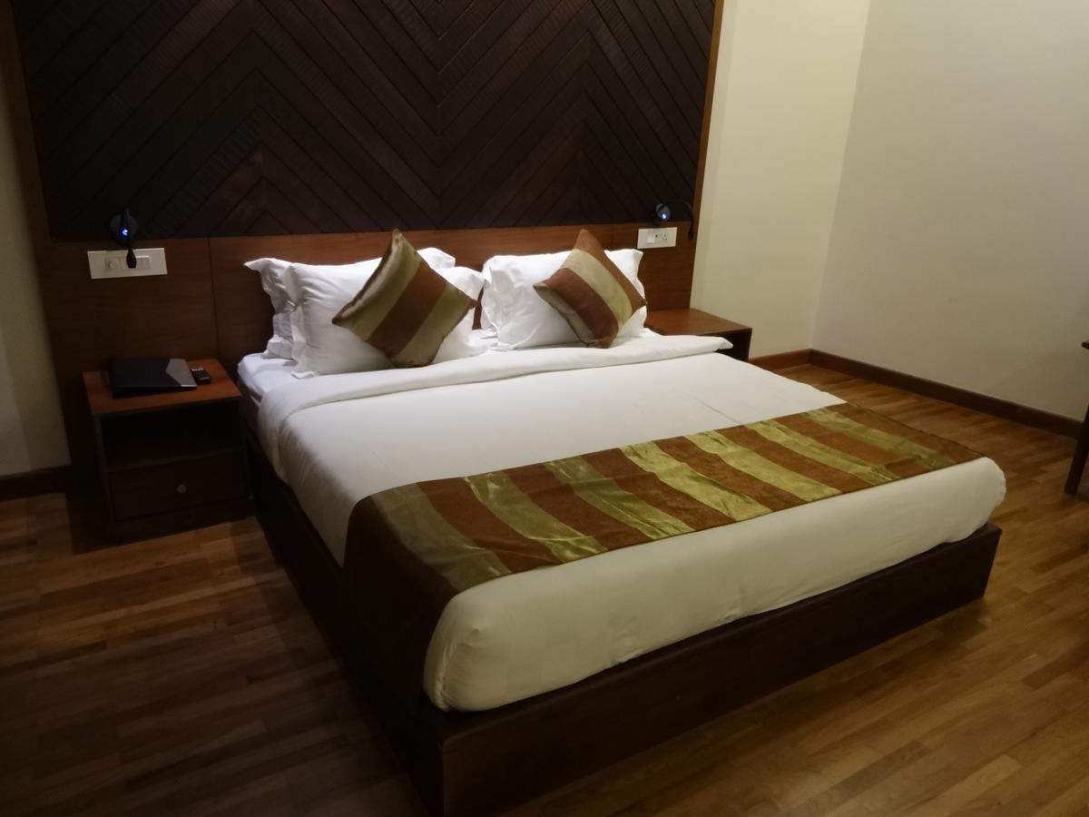Woodies Bleisure Hotel Kozsíkóde Kültér fotó