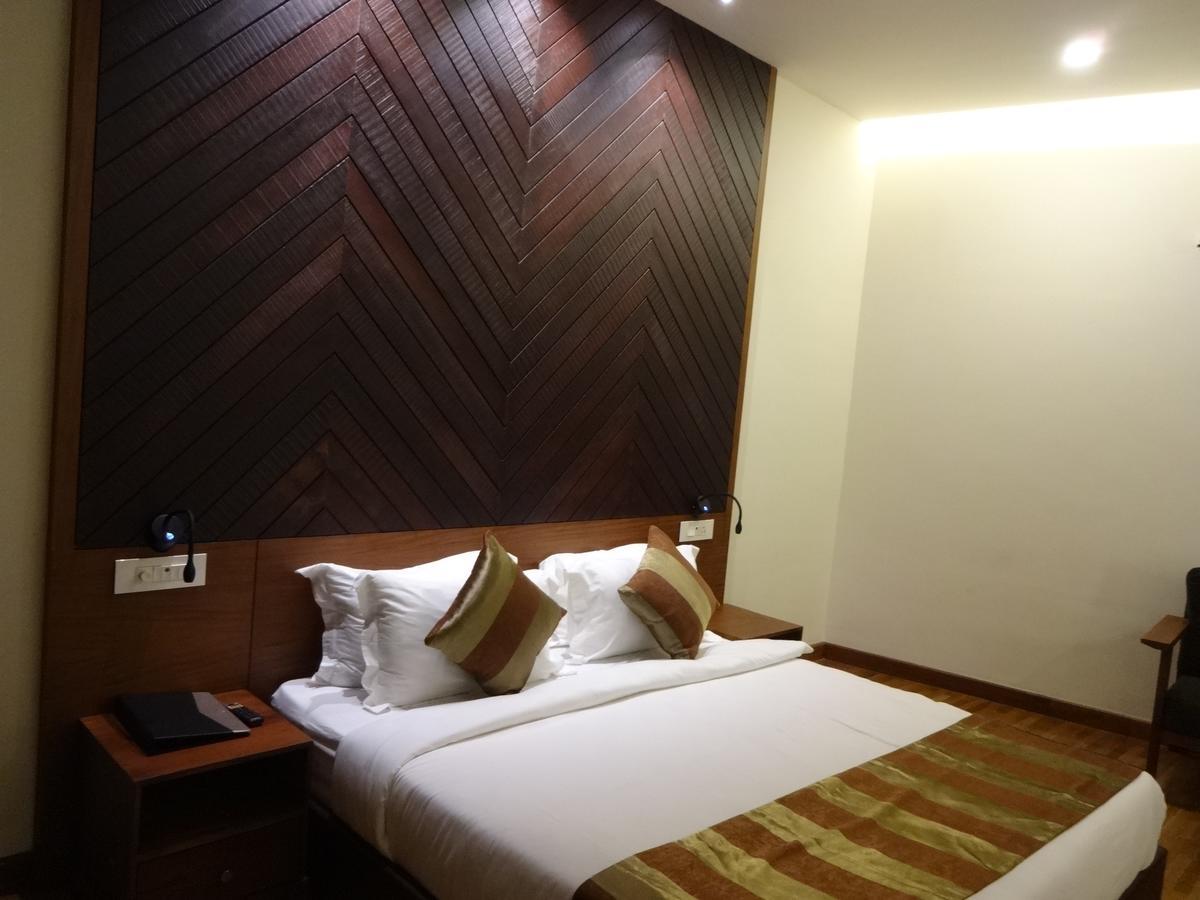 Woodies Bleisure Hotel Kozsíkóde Kültér fotó