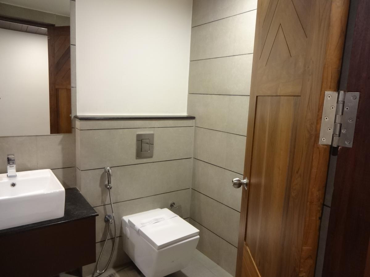 Woodies Bleisure Hotel Kozsíkóde Kültér fotó